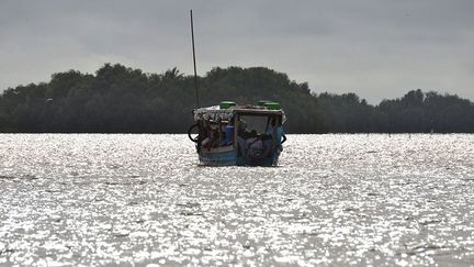 vit en zone côtière et plus de 40% des Ivoiriens tirent leurs moyens de subsistance de cet espace», selon les chiffres du ministère ivoirien de l'Environnement.  ( ISSOUF SANOGO / AFP)