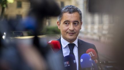 Le ministre de l'Intérieur, Gérald Darmanin, lors d'une visité à Lyon, le 30 juillet 2022. (NORBERT GRISAY / HANS LUCAS)