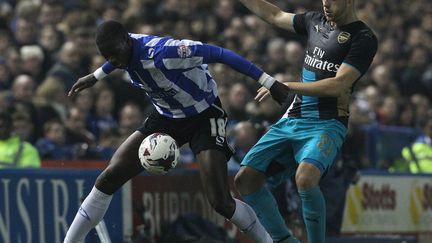 Lucas Joao se joue de la défense d'Arsenal (LINDSEY PARNABY / AFP)