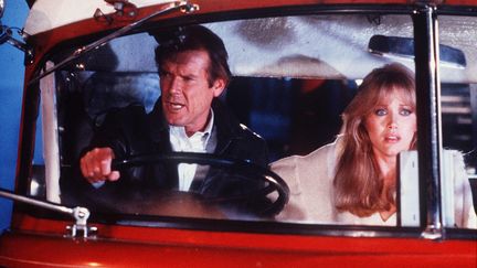 Roger Moore, dans "Octopussy", en 1983. (KOBAL / AFP)