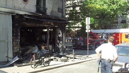 L'agence Point Soleil qui a br&ucirc;l&eacute; lundi 27 ao&ucirc;t 2012, dans le 13e arrondissement de Paris. (CITIZENSIDE.COM / AFP)