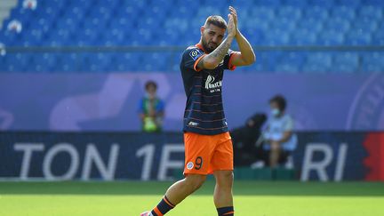 Andy Delort, en sortant du terrain lors du match entre Montpellier et Lorient, le 22 août 2021. (SYLVAIN THOMAS / AFP)