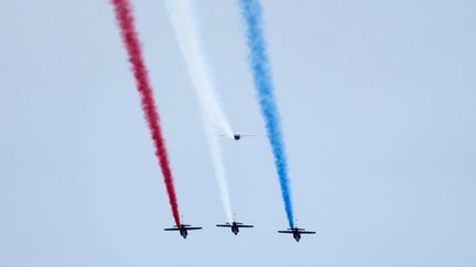 The Patrouille de France in the skies of Paris, July 9, 2024. (ROY ISSA / AFP)