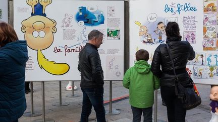 Visiteurs devant l'exposition pour les 25 ans de Titeuf au 45e Festival de bande-dessinée d'Angoulême (2018)
 (Yohan Bonnet / AFP)