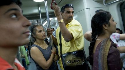 &nbsp; (Des utilisateurs du métro de New Delhi © Maxppp)