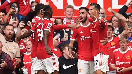 Cristiano Ronaldo, buteur pour son retour avec Manchester United face à Newcastle lors de la quatrième journée de Premier League, samedi 11 septembre 2021. (OLI SCARFF / AFP)