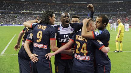 Les joueurs du PSG c&eacute;l&eacute;brant un but marqu&eacute; lors de la finale de la Coupe de la Ligue remport&eacute;e contre Lyon, samedi 19 avril 2014 au Stade de France. (JEAN MARIE HERVIO / DPPI MEDIA / AFP)