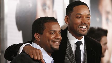 Alfonso Ribeiro et&nbsp;Will Smith, à Westwood (Californie, Etats-Unis), le 16 décembre 2008. (MARIO ANZUONI / REUTERS)