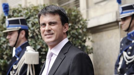 Le ministre de l'Int&eacute;rieur, Manuel Valls, place Beauveau &agrave; Paris,&nbsp;mardi 31 juillet 2012. (BERTRAND GUAY / AFP)