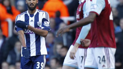 Nicolas Anelka c&eacute;l&egrave;bre un but en faisant une "quenelle", le 28 d&eacute;cembre 2013, lors du match West Ham United-West Bromwich Albion, &agrave; Londres (Royaume-Uni). (IAN KINGTON / AFP)