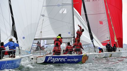 Sébastien Petithuguenin avec son équipage à bord du bateau Paprec, en 2014.&nbsp; (FRANCOIS VAN MALLEGHEM / FRANCOIS VAN MALLEGHEM)