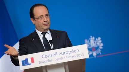 La conf&eacute;rence de presse de Fran&ccedil;ois Hollande, lors d'un sommet europ&eacute;en &agrave; Bruxelles (Belgique), le 14 mars 2013. (BERTRAND LANGLOIS / AFP)