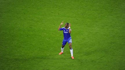 La joie de Didier Drogba, qui a port&eacute; &agrave; lui tout seul son club de Chelsea sur le toit de l'Europe. (JOHN MACDOUGALL / AFP)