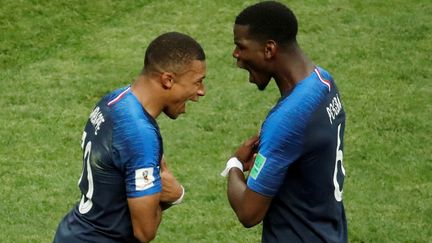 Et de quatre ! Kylian Mbappe et Paul Pogba hurlent de joie après le quatrième but de l'équipe de France en finale face à la Croatie, le 15 juillet 2018.&nbsp; (CHRISTIAN HARTMANN / REUTERS)