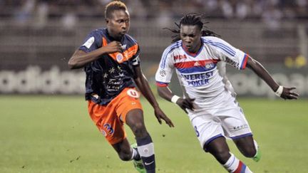 Le Lyonnais Gomis à la lutte avec le Montpellierain Yanga-Mbiwa