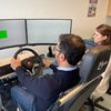 Un simulateur de conduite présenté par Benjamin Malafosse, le directeur général du Ceremh, et l'ergothérapeute Marie Gawalkiewicz, à Plaisir dans les Yvelines. (ANNE-LAURE DAGNET / RADIO FRANCE)