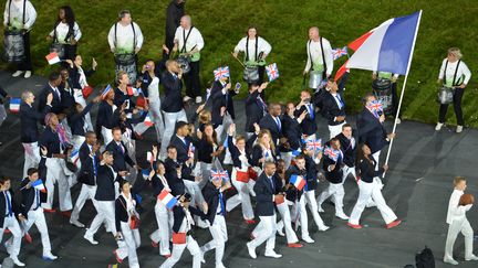 La délégation française emmenée par Laura Flessel lors de la cérémonie d'ouverture des JO de Londres (SAEED KHAN / AFP)