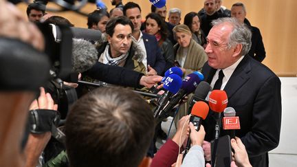 The president of MoDem, François Bayrou, speaks to the media at the Paris court, February 5, 2024. (MIGUEL MEDINA / AFP)