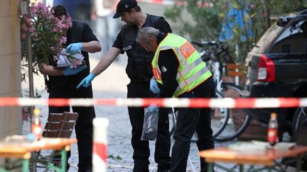 Dimanche 24 juillet, un réfugié syrien de 27 ans se fait exploser près d'un festival de musique. C'est la première attaque suicide sur le sol allemand. (Daniel Karmann / dpa / AFP)