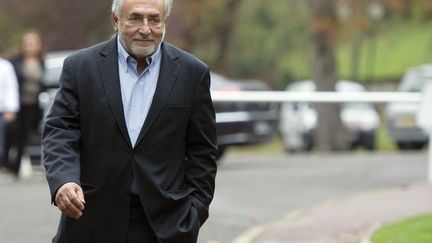 Dominique Strauss-Kahn &agrave; Sarcelles (Val-d'Oise) le 9 octobre 2011.&nbsp; (MIGUEL MEDINA / AFP)