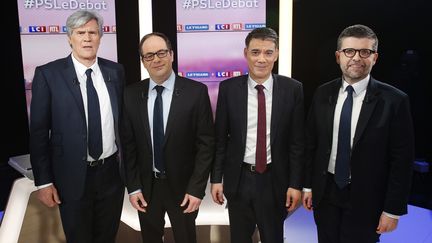 Les candidats à la primaire du Parti socialiste, Stéphane Le Foll, Emmanuel Morel, Olivier Faure et Luc Carvournas, le 7 mars 2018 à Boulogne-Billancourt (Hauts-de-Seine). (GEOFFROY VAN DER HASSELT / AFP)