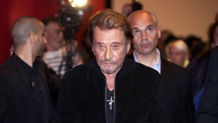 Johnny Hallyday &agrave; l'avant-premi&egrave;re de "Salaud, on t'aime", le 28 mars 2014 &agrave;&nbsp;Braine-L'Alleud (Belgique). (NICOLAS MAETERLINCK / BELGA)