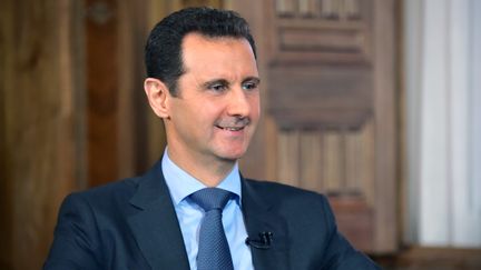 Le dirigeant syrien Bachar Al-Assad, le 26 ao&ucirc;t 2015, lors d'une interview &agrave; Damas (Syrie). (SANA / AFP)