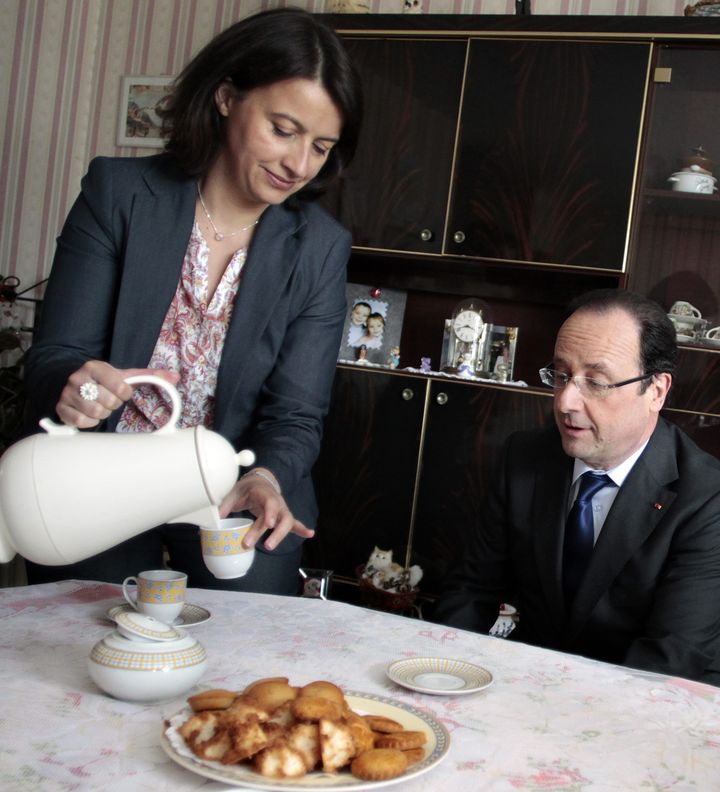 C&eacute;cile Duflot et Fran&ccedil;ois Hollande lors d'un d&eacute;placement &agrave; Caen (Calvados), le 17 mai 2013. (MAXPPP)