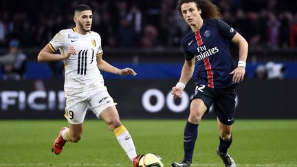 David Luiz et Yassine Benzia lord du match de championnat au Parc des Princes le 13 février dernier (0-0) (MIGUEL MEDINA / AFP)