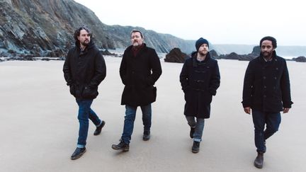 Les quatre membres d'Elbow conjuguent le temps qui passe à leur manière (Andy Whitton)