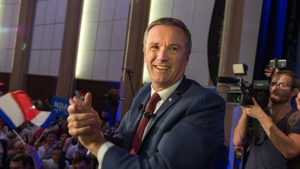 Nicolas Dupont-Aignan, président de Debout la République, lors d'un meeting à Paris, le 9 mars 2017. (SERGE TENANI / CITIZENSIDE / AFP)