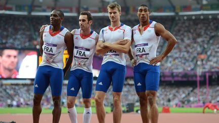 Les Fran&ccedil;ais Ronald Pognon,&nbsp;Pierre-Alexis Pessonneaux,&nbsp;Christophe Lemaitre et&nbsp;Jimmy Vicaut, apr&egrave;s la finale du relais 4X100m aux JO de Londres (Royaume-Uni), le 10 ao&ucirc;t 2012. (ERIC FEFERBERG / AFP)