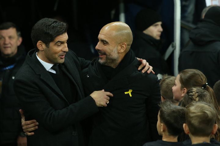 Paulo Fonseca et Pep Guardiola, le 6 décembre 2017 à Kharkiv. (STANISLAV VEDMID / AFP)