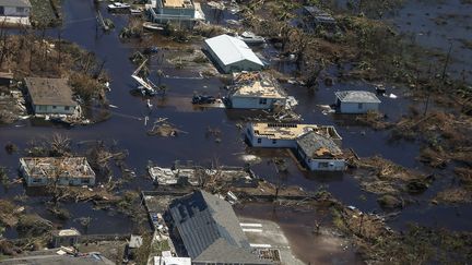 Une vue aérienne des inondations et des dommages causés par l'ouragan Dorian sur l'île Abaco dans l'archipel des Bahamas, le 5 septembre 2019.&nbsp; (ADAM DELGIUDICE / AFP)