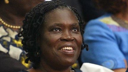 Simone Gbagbo, l'ancienne première dame de Côte-d'Ivoire, au tribunal d'Abidjan pour l'ouverture de son procès, le 26 décembre 2014. (AFP PHOTO / SIA KAMBOU)