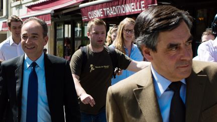 Jean-Fran&ccedil;ois Cop&eacute; (&agrave; gauche) et Fran&ccedil;ois Fillon (&agrave; droite), le 24 avril 2013 &agrave; Paris. (MARTIN BUREAU / AFP)