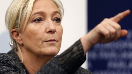 La pr&eacute;sidente du Front national, Marine Le Pen, au Parlement europ&eacute;en de Strasbourg (Bas-Rhin), le 23 octobre 2013.&nbsp; (VINCENT KESSLER / REUTERS)