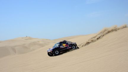 Nasser Al-Attiyah à bord de son Buggy (FRANCK FIFE / AFP)