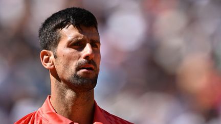 Novak Djokovic lors de son match au premier tour de Roland-Garros face à Aleksandar Kovacevic, le 29 mai 2023. (EMMANUEL DUNAND / AFP)