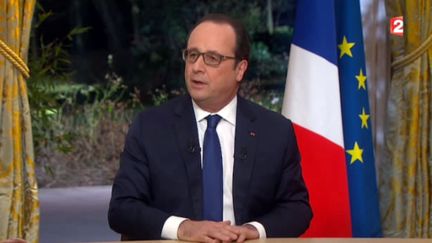 &nbsp; (François Hollande répondait en direct de l'Elysée et pendant une trentaine de minutes aux questions de Gilles Bouleau (TF1) et David Pujadas (France 2) © MaxPPP)