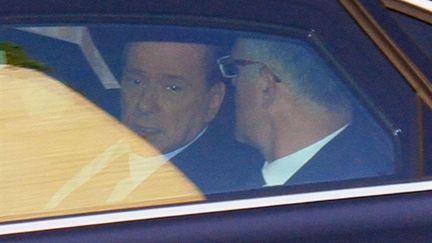 Le président du Conseil italien, Silvio Berlusconi, arrivant au tribunal de Milan le 11 avril 2011 (AFP - GIUSEPPE CACACE)