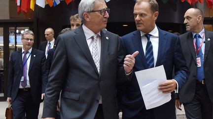 Le pr&eacute;sident de la Commission europ&eacute;enne, Jean-Claude Juncker, et le pr&eacute;sident du Conseil europ&eacute;en, le 13 juillet 2015 &agrave; Bruxelles (Belgique).&nbsp; (THIERRY CHARLIER / AFP)