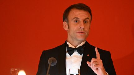 Emmanuel Macron lors du dîner d'Etat en Suisse, le 15 novembre 2023. (BERTRAND GUAY / AFP)