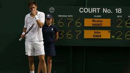 Le Français Nicolas Mahut lors du match historique qui l'opposa à l'Américain John Isner en 2010 à Wimbledon. (GLYN KIRK / AFP)