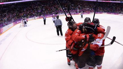 Le Canada champion olympique (ANDREJ ISAKOVIC / AFP)