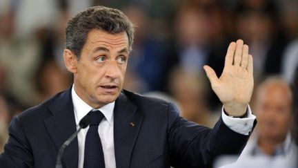 Nicolas Sarkozy au Cap d'Agde le 26 juillet 2011 (AFP - ERIC FEFERBERG)