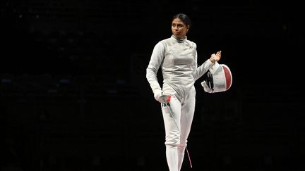 La Française Thibus Ysaora lors de l'épreuve par équipe de&nbsp;fleuret féminin des Jeux olympiques de Tokyo, le 29 juillet 2021. (CROSNIER JULIEN / AFP)