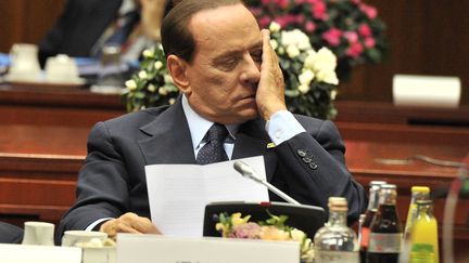 Silvio Berlusconi, le chef du gouvernement italien, lors d'une rencontre des chefs d'Etat et de gouvernement de la zone euro &agrave; Bruxelles le 23 octobre 2011. (GEORGES GOBET/AFP)