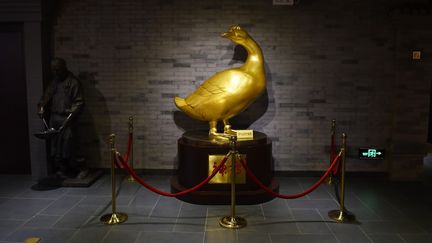 Le Musée du canard laqué de Pékin s'ouvre à l'occasion du 150ème anniversaire du grand restaurant Quanjude, spécialiste du met.
 (GREG BAKER / AFP)