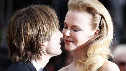 Membre du jury présidé par Steven Spielberg, le baiser qu'elle échange avec son mari, le chanteur de country australien Keith Urban, a été le plus photographié du Festival.
 (Valérie Hache/AFP)